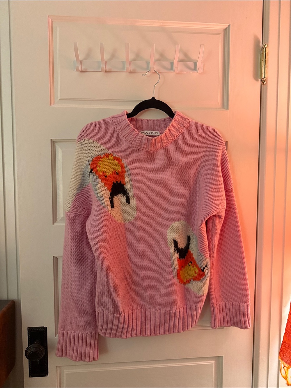 JW ANDERSON Pink Crewneck Sweater with Orange and Black Motifs